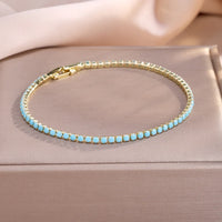 Pulsera Tenis Dorado y Turquesa