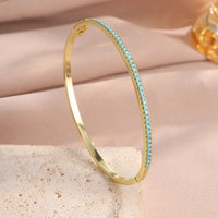 Pulsera Tenis Dorado y Turquesa