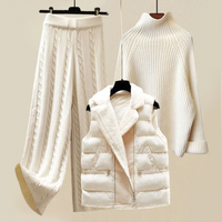 Conjunto de Punto Cuello Alto con Chaleco Acolchado y Pantalón Pierna Ancha