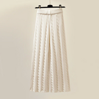 Conjunto de Punto Cuello Alto con Chaleco Acolchado y Pantalón Pierna Ancha
