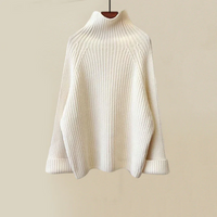 Conjunto de Punto Cuello Alto con Chaleco Acolchado y Pantalón Pierna Ancha